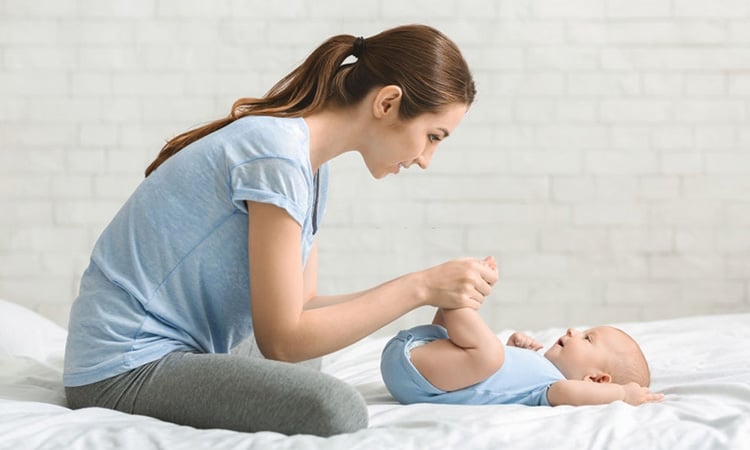 Baby massage strengthens bonds between mother and child