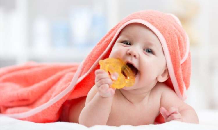 Give baby teething toy before feeding